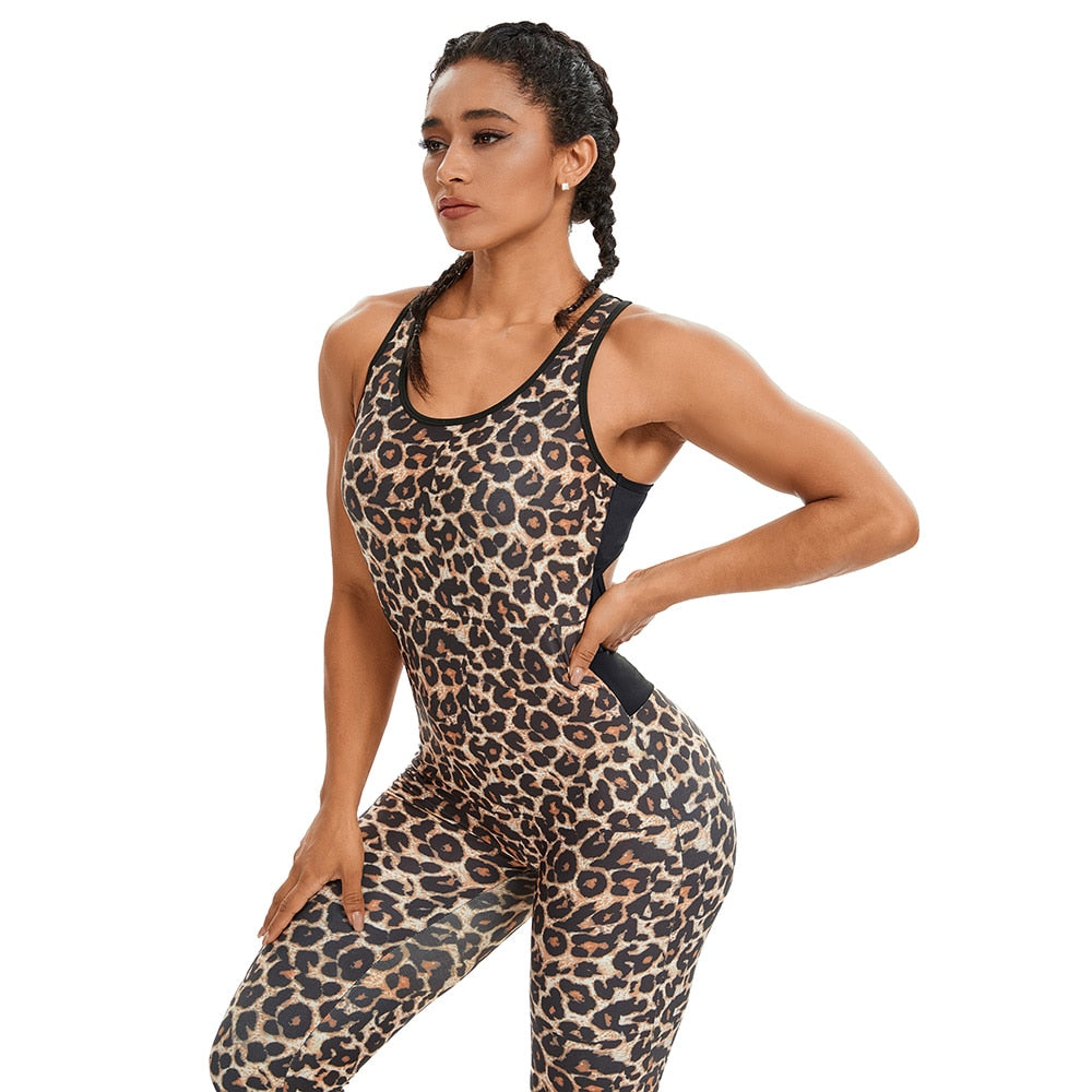 Fitted Backless Jumpsuit With Criss Cross Straps.